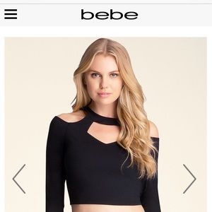 Long sleeve blue cut out shoulder top from Bebe